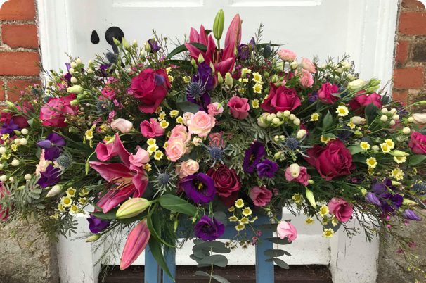 Colourful flower arrangement provided by Belle, flower delivery new forest & florist beaulieu.
