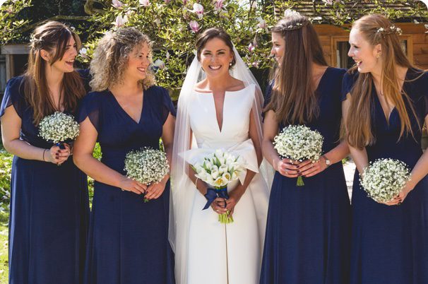 Bride holding flowers provided by leading florist new forest & flower delivery beaulieu.
